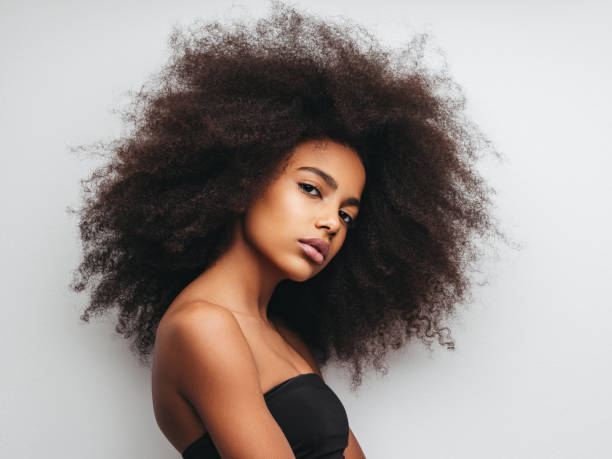 istock Beautiful girl with curly hairstyle 1289341902
