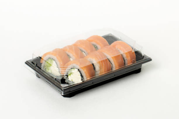 istock Philadelphia rolls delivered in plastic container, food delivery service concept 1289341943