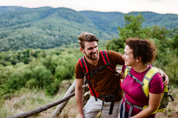 istock Young couple relaxing at the mountain 1289342180