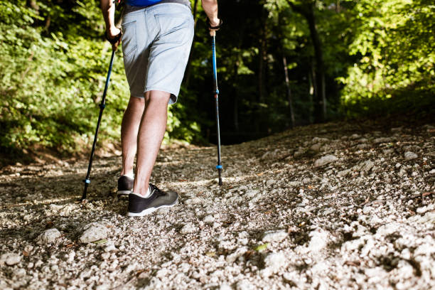 istock Young man climbing the mountain 1289343269