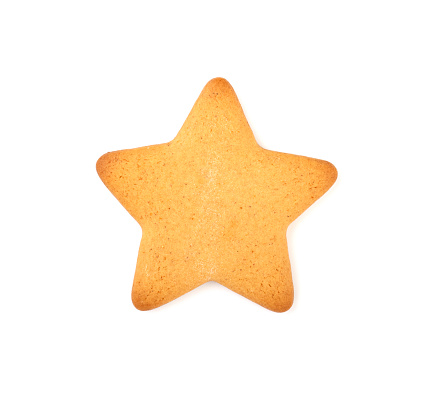 Christmas gingerbread in the shape of a star, isolated on a white background. festive treats for Christmas and new year. Christmas tree decoration