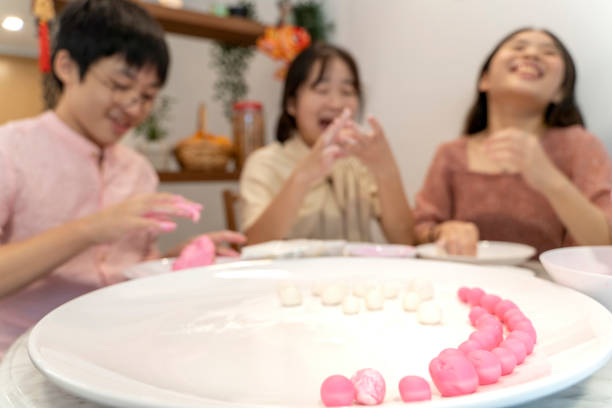 istock Making rice dumpling together on Chinese New Year 1289344490