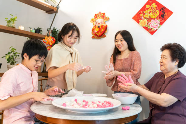 istock Making rice dumpling together on Chinese New Year 1289344552