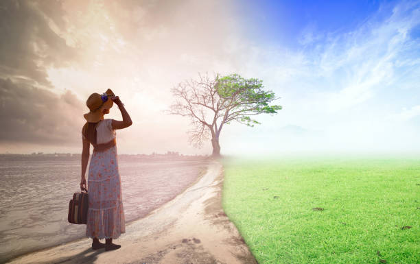 Climate worsened with good atmosphere concept Woman standing between climate worsened with good atmosphere new life stock pictures, royalty-free photos & images
