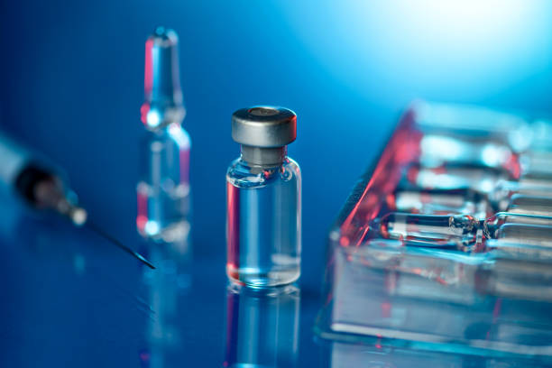 istock Vaccine in laboratory - flu shot and Covid-19 vaccination 1289345736