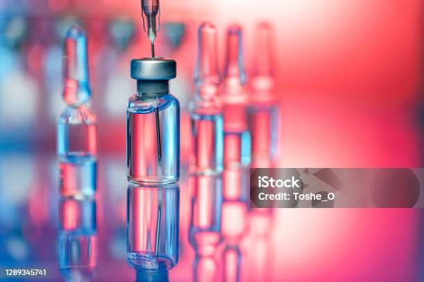 Vaccine In Laboratory Flu Shot And Covid19 Vaccination Stock Photo - Download Image Now