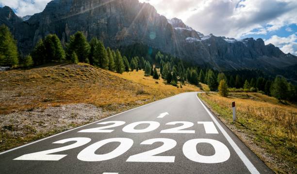 istock 2021 New Year road trip travel and future vision concept . 1289346581