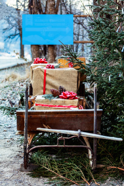 istock Wooden sledge from the front with presents 1289350935
