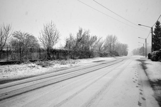 istock Country Road with snow 1289351170