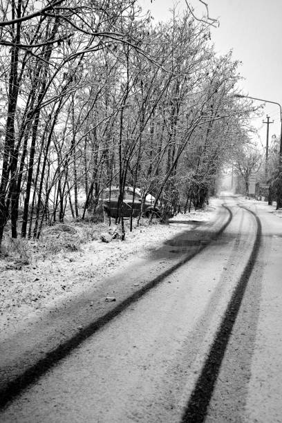 istock Country Road with snow 1289351289