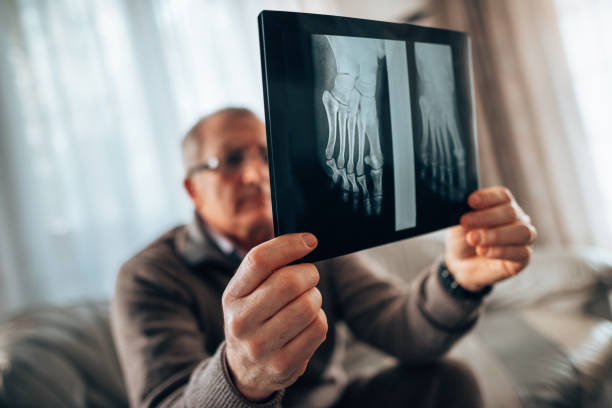 istock doctor checking the xray at the office 1289353273