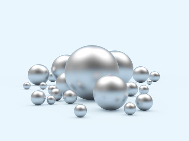 istock A group of silver spheres of various sizes on a light blue 1289353284
