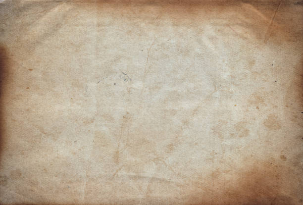 Vintage old paper with scratches and stains texture stock photo