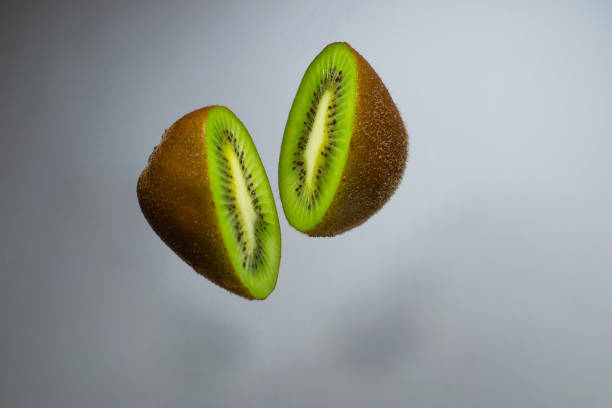 Kiwi fruit sliced. Diet fruit Fruits and vegetables in levitation levitation stock pictures, royalty-free photos & images