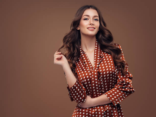 istock Woman with curly hairstyle 1289357365