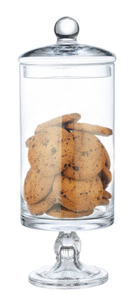 istock Glass storage jar for cookies isolated on white 1289358177