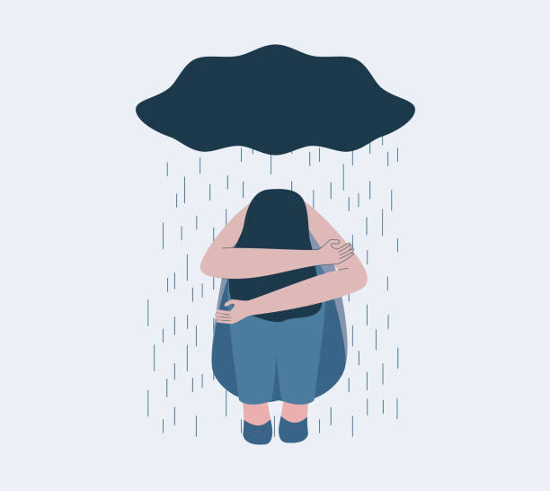 istock Unhappy girl sitting and dark cloud above her 1289362507