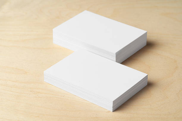 istock Two piles of blank business cards on table 1289363044