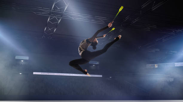 istock Rhythmic gymnast in professional arena. 1289366582