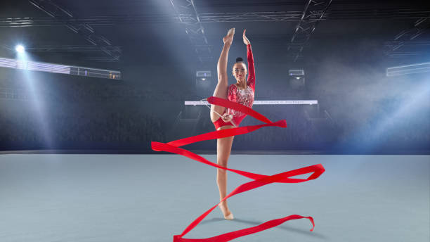 istock Rhythmic gymnast in professional arena. 1289366640