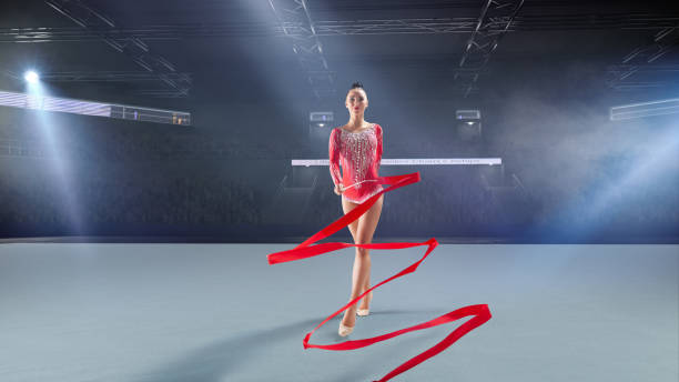 istock Rhythmic gymnast in professional arena. 1289366661