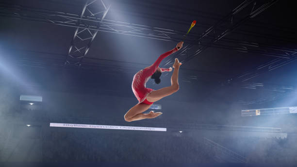 istock Rhythmic gymnast in professional arena. 1289366715