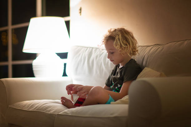 istock Child reading book. Kids read books. 1289369521