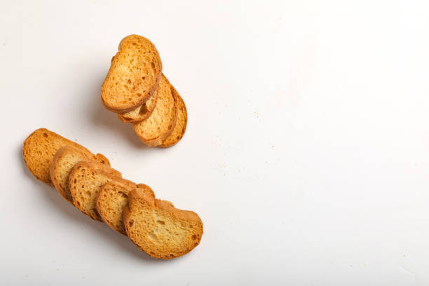 istock crispy rusk, cake rusk over white background 1289370980
