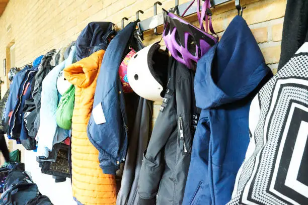 wardrobe rack with children clothes at school