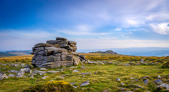 Sunset view of Dartmoor National Park, a vast moorland in the county of Devon