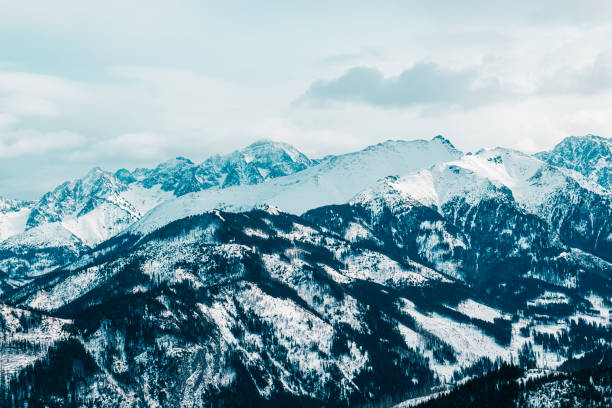 istock Fantastic mountain landscape, mountains covered with snow, creative concept. 1289387334