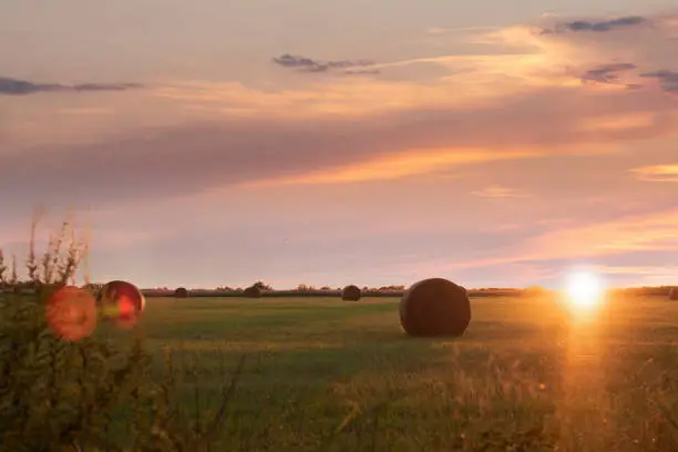 Sunset over a hay field in Oklahoma