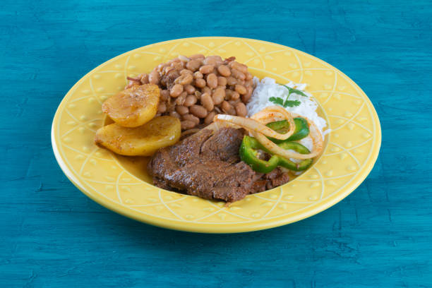 istock Brazilian lunch food dish with blue background. 1289388740