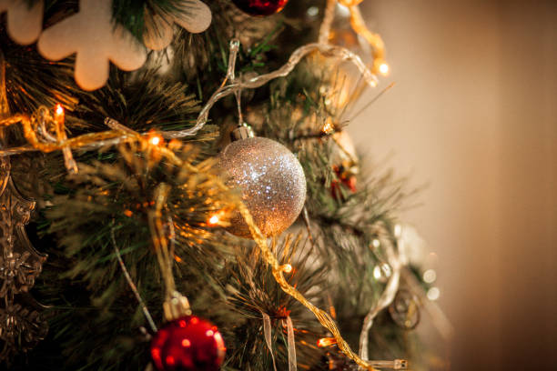 istock Christmas Tree, Ornaments and Defocused Lights Background 1289388938