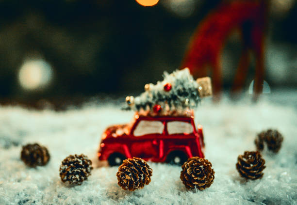 istock Decorated retro red car with festive New Year lights 1289389518