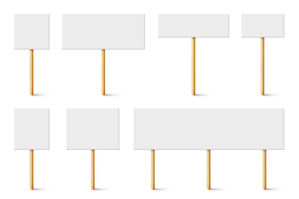 istock Blank protest sign with wooden holder. Realistic vector demonstration banner. Strike action cardboard placard mockup 1289389930
