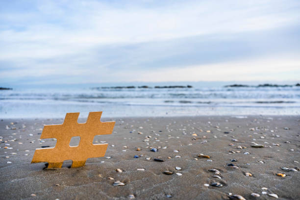 istock Hashtag on sea beach concept 1289392702