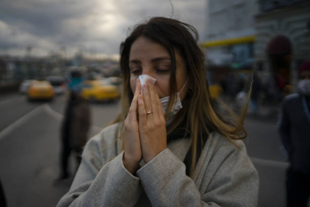 istock Sick young woman with cold and flu 1289393083