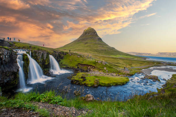 The beautiful sunset at Kirkjufell waterfall in Iceland stock photo