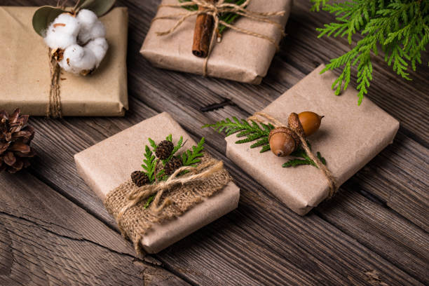 istock Christmas gift boxes in craft paper 1289400337
