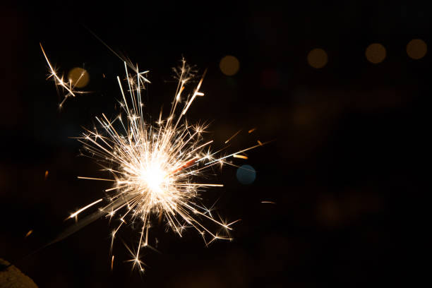 istock Bengal fire sparkles isolated on black background 1289401568