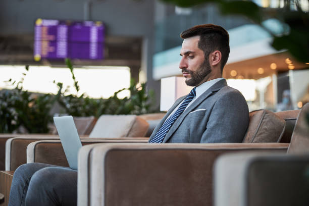 istock Young businessman concentrated on his work in laptop 1289407999