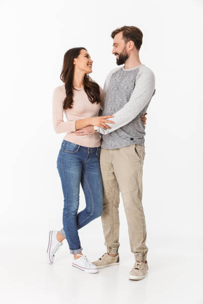 istock Happy young loving couple looking at each other. 1289410110