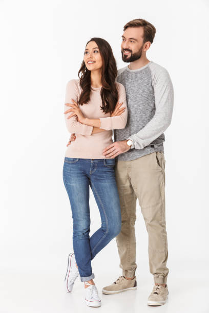 istock Happy young loving couple isolated 1289410330