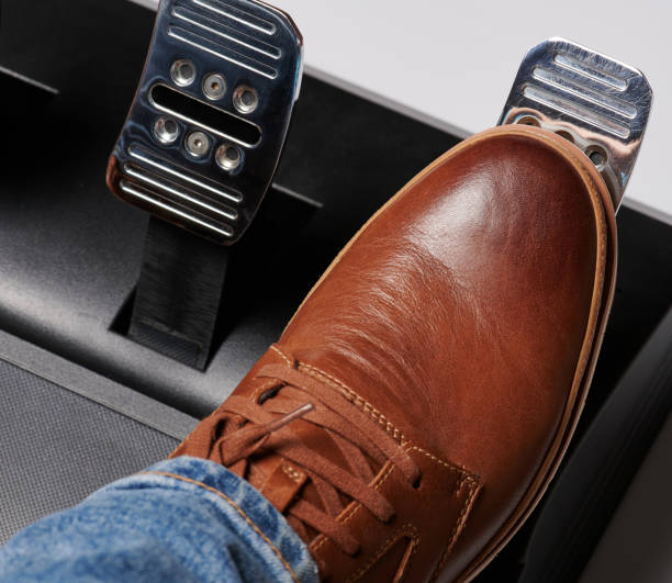 istock Press shiny metal accelerator car pedal 1289411757