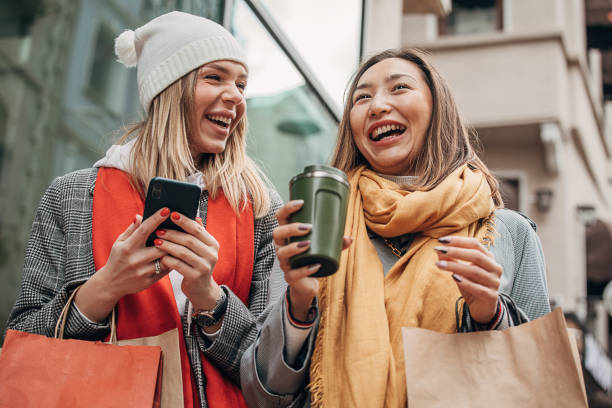 istock Modern women in city together 1289414591