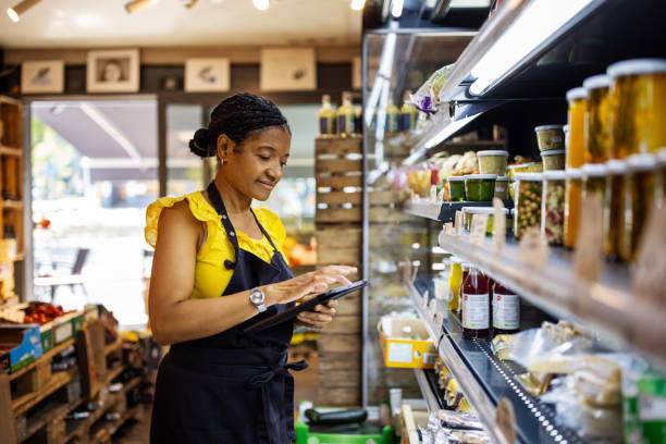 istock Saleswoman checking inventory in store 1289417759