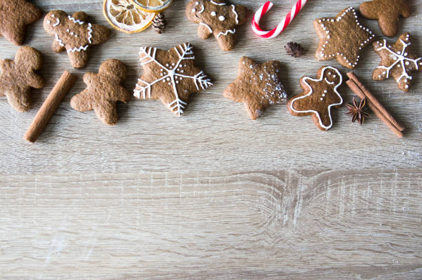 istock background with gingerbread men and snowflakes 1289418845