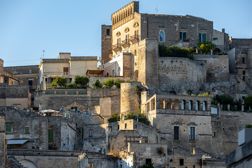 Matera, Italy - September 14, 2019: View of the Sassi di Matera a historic district in the city of Matera, well-known for their ancient cave dwellings. Basilicata. Italy