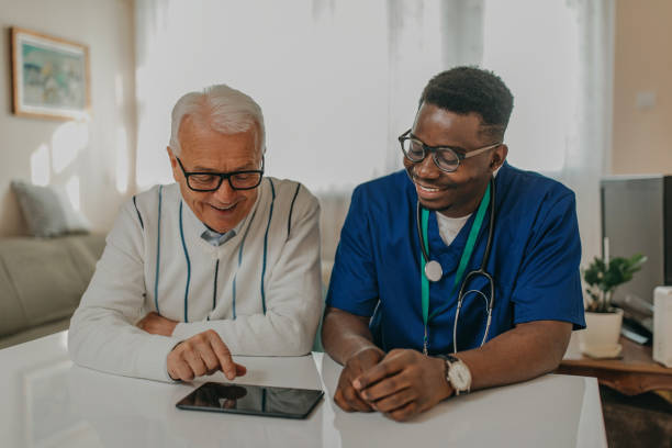 istock Doctor explaining tele medicine to a patient 1289421907